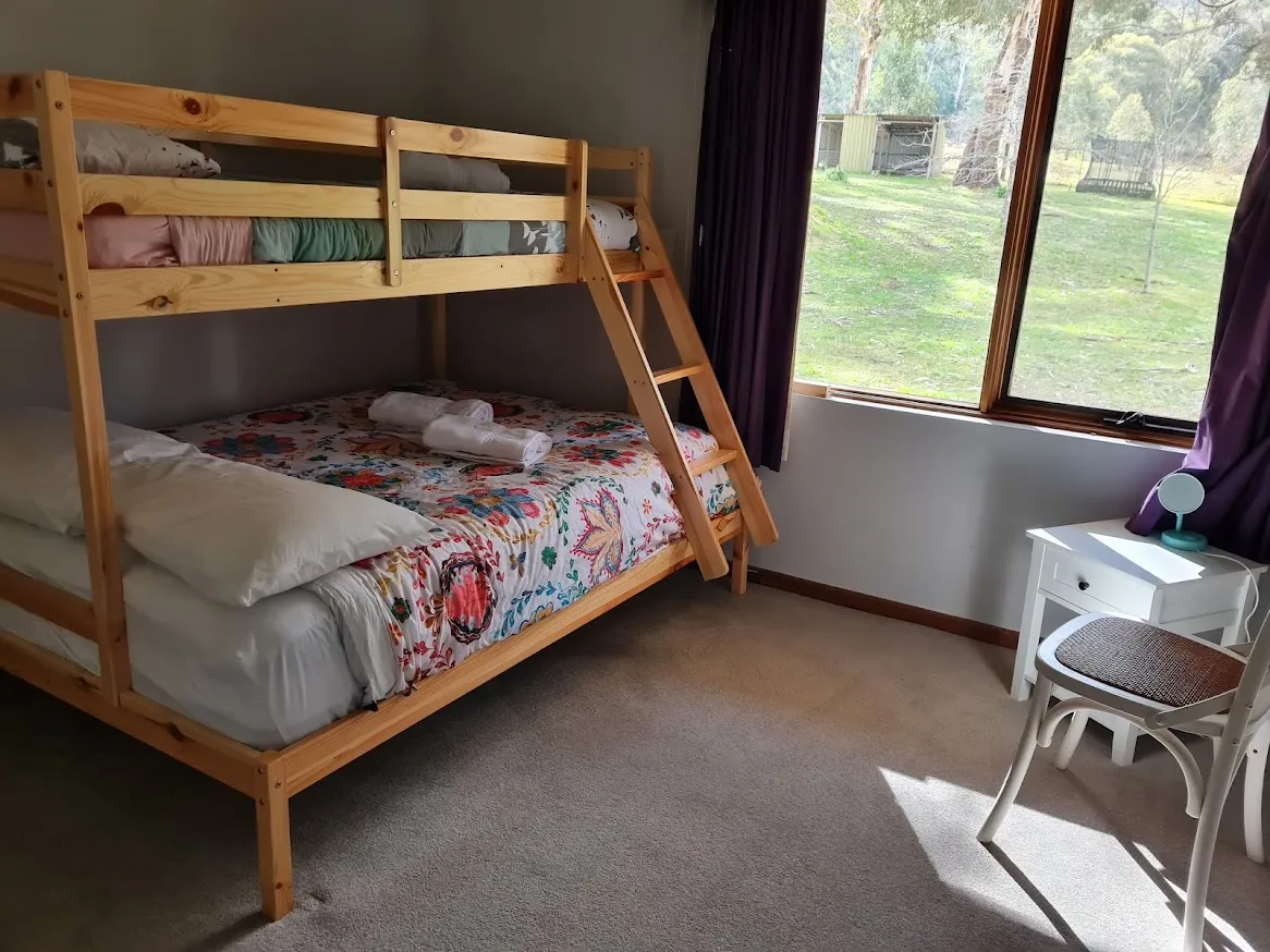 Bunk bed room with garden views