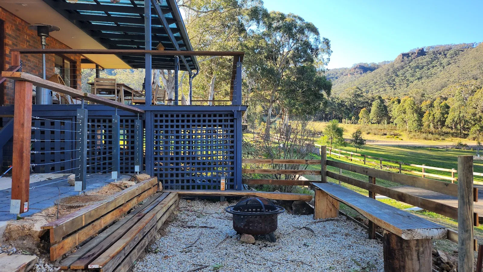 Outdoor firepit area with mountain views
